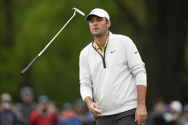 Scottie Scheffler flips his putter on the eighth hole during the third round of the PGA Championship golf tournament at Oak Hill Country Club on Saturday, May 20, 2023, in Pittsford, N.Y. (AP Photo/Eric Gay)
