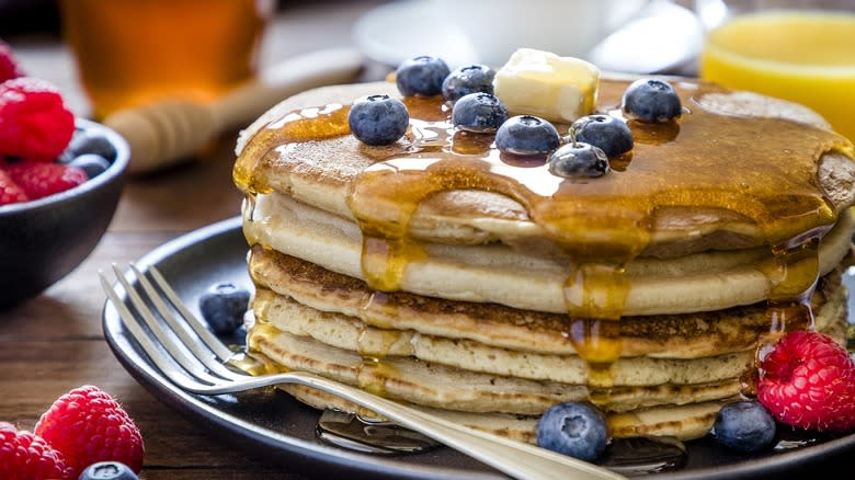 Stack of pancakes with fruit