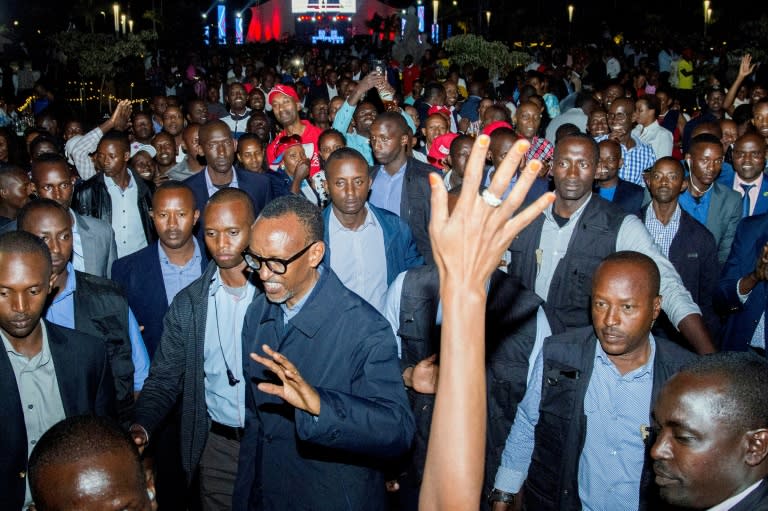 Rwandan President Paul Kagame (C) celebrated his reelection with supporters in Kigali on Saturday