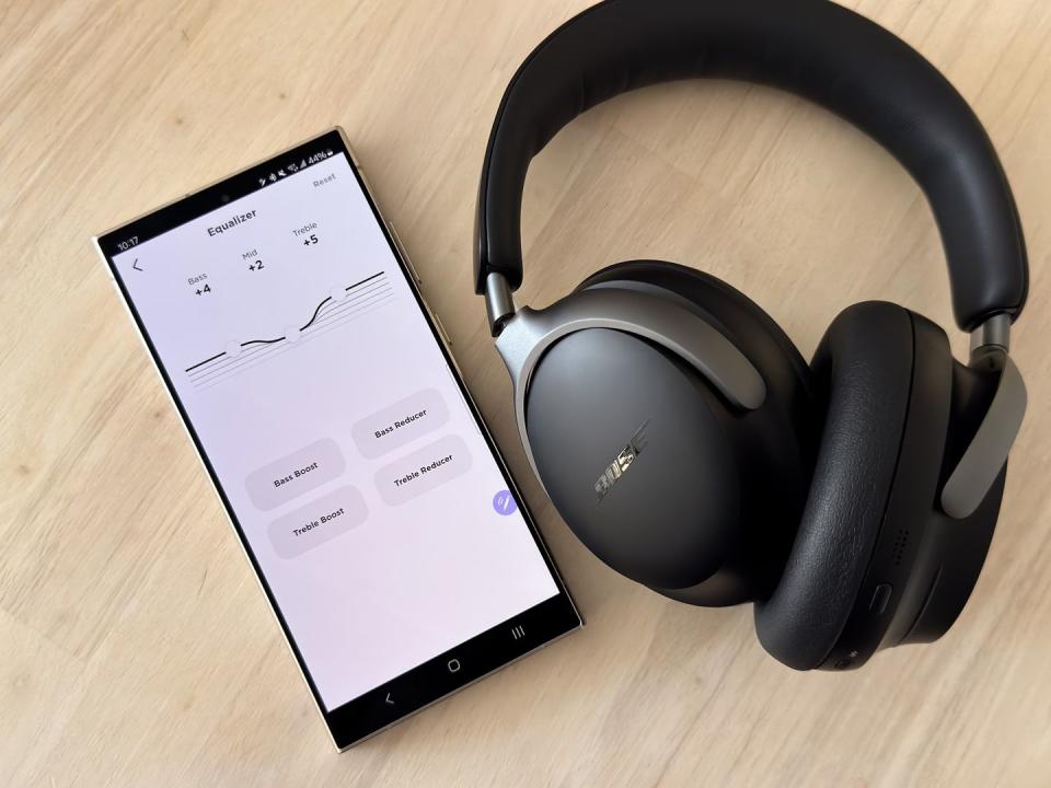 bose audio app next to headphones