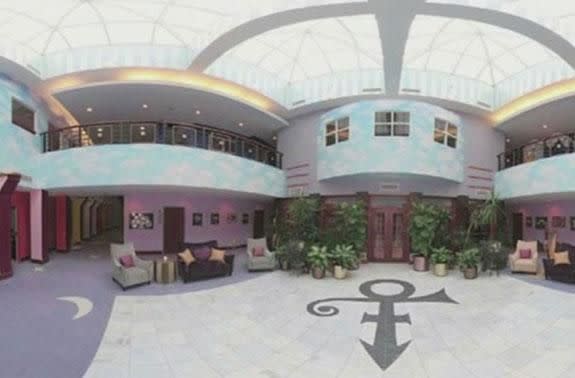 The front lobby featuring balconies and clouds painted on walls. Source: CBS2