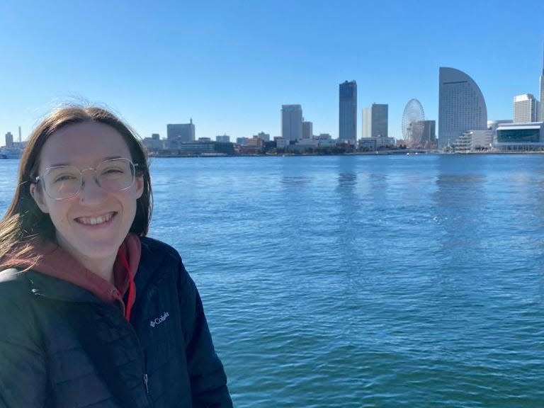 Chloe McLeod of Monroe stands in front of the Port of Yokohama in Japan during a boat tour of the port.