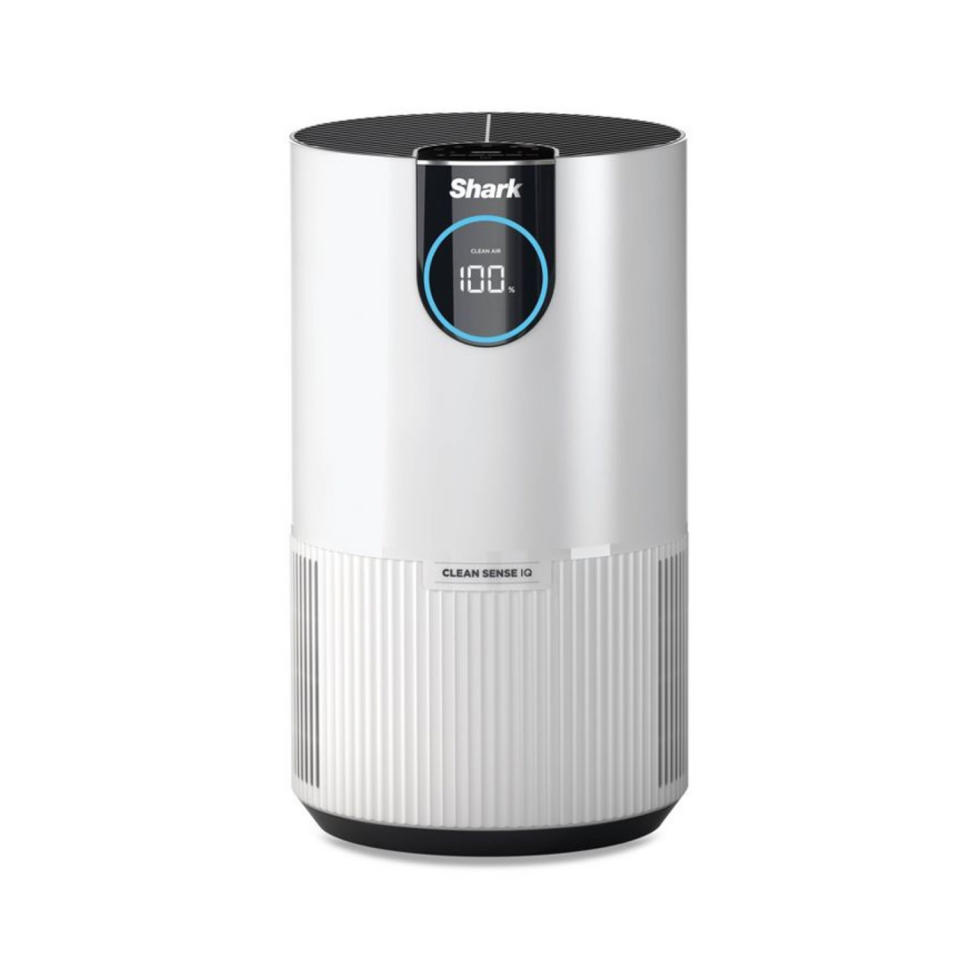 An image of a Shark Air Purifier with Nanoseal HEPA, Cleansense IQ, Odor Lock, a white cylindrical device that has a numerical readout that says 100 percent clean air