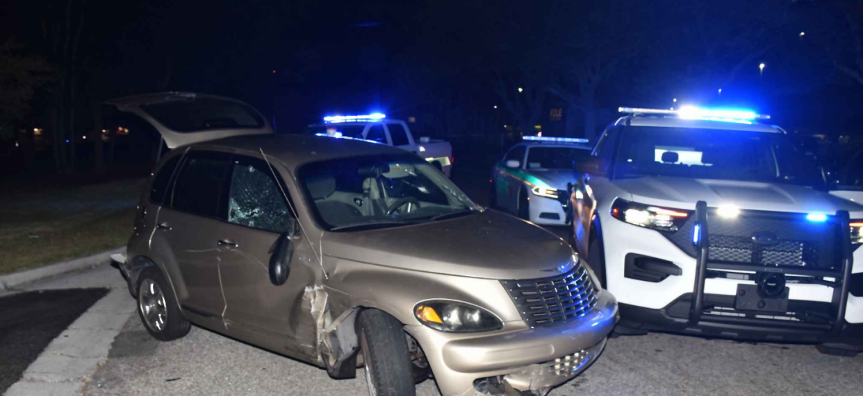 This crime scene photo shows the crashed and bullet-riddled Chrysler PT Cruiser that Daniel Palato was killed in by Clay County deputies following a chase on April 27, 2022.