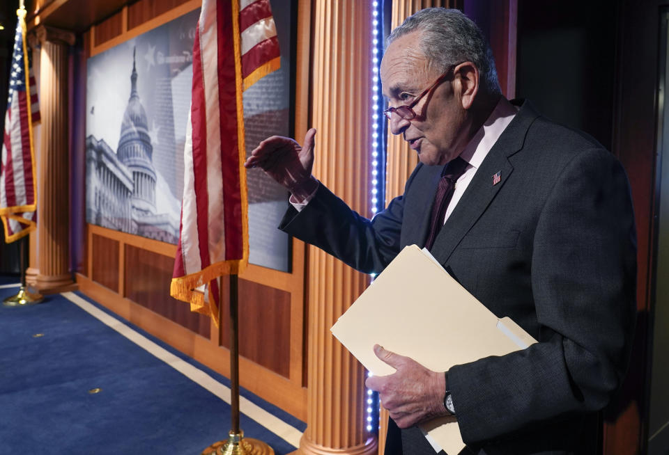 Senate Majority Leader Chuck Schumer of N.Y., answers one final question before leaving after a news conference Friday, Aug. 5, 2022, at the Capitol Hill in Washington. (AP Photo/Mariam Zuhaib)