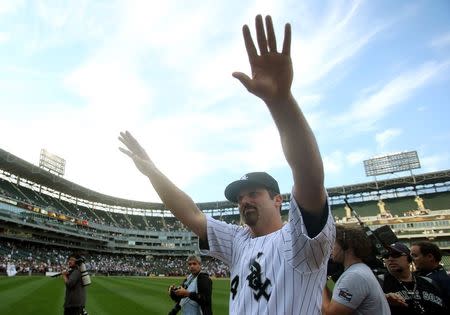 Konerko, Rollins named co-winners of Roberto Clemente Award