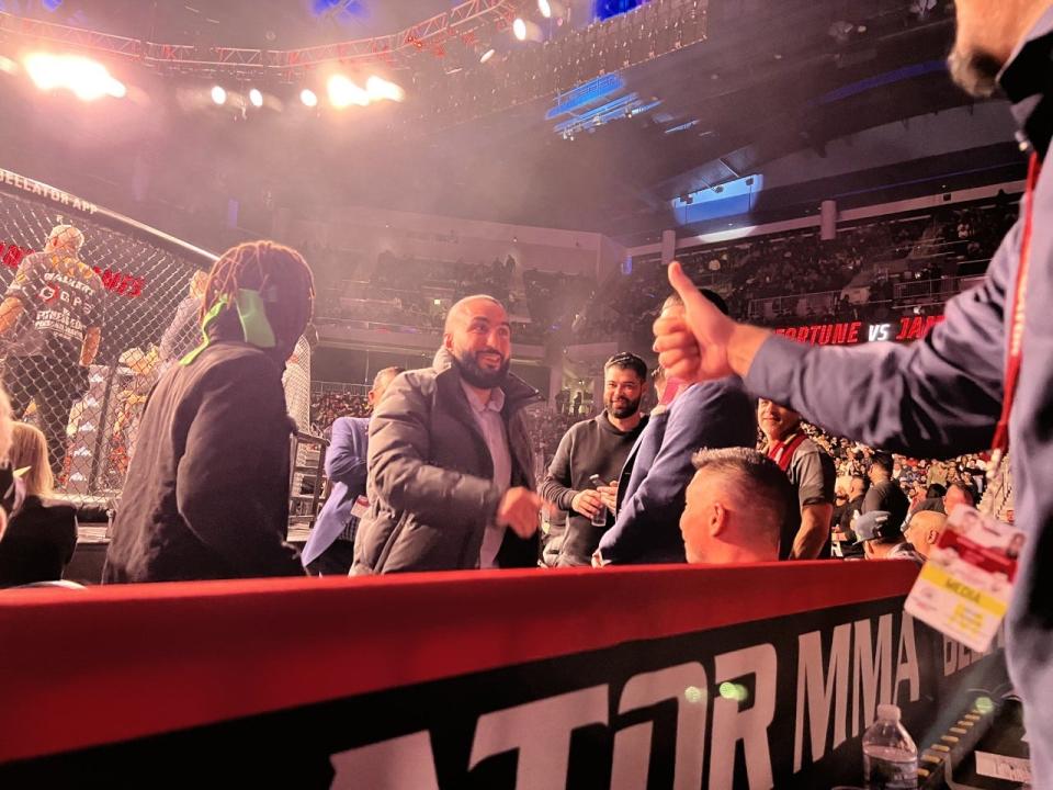 Khabib Nurmagomedov chats with some of his fans while he was in Chicago at the Wintrust Arena on Friday, Nov. 18, 2022, to watch his cousin Usman Nurmagomedov fight on the Bellator 288 card.