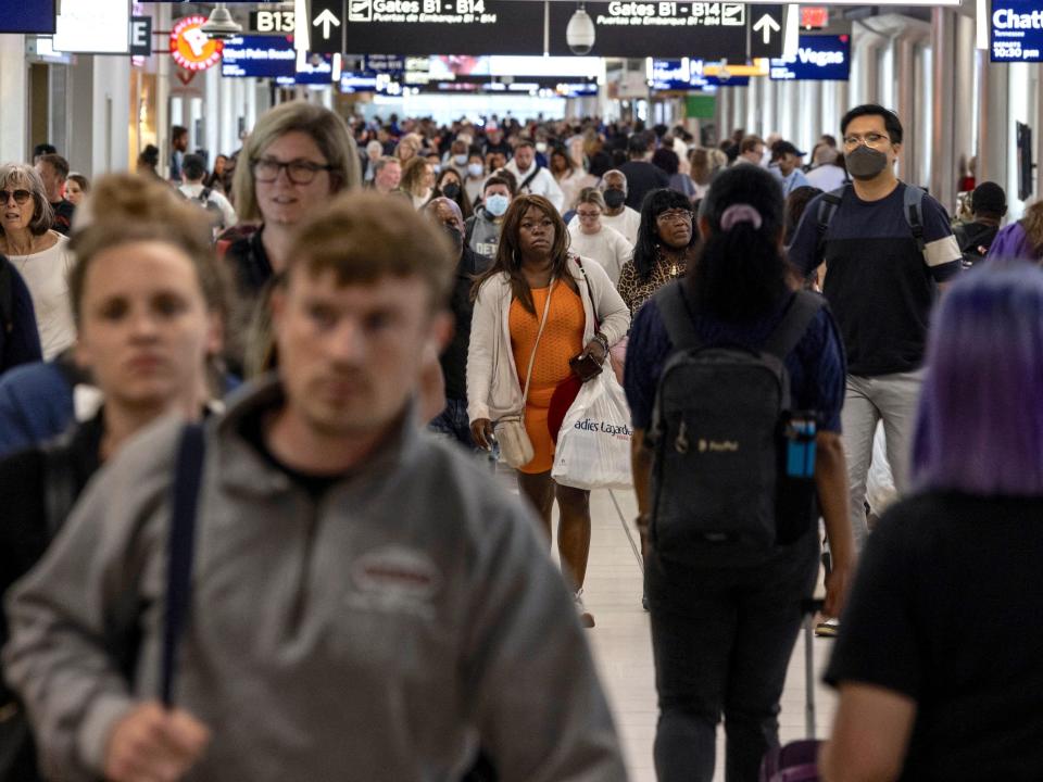 Passengers walk along terminal B of Hartsfield-Jackson Atlanta International Airport in Atlanta, Georgia, U.S., September 3, 2022. REUTERS/Carlos Barria