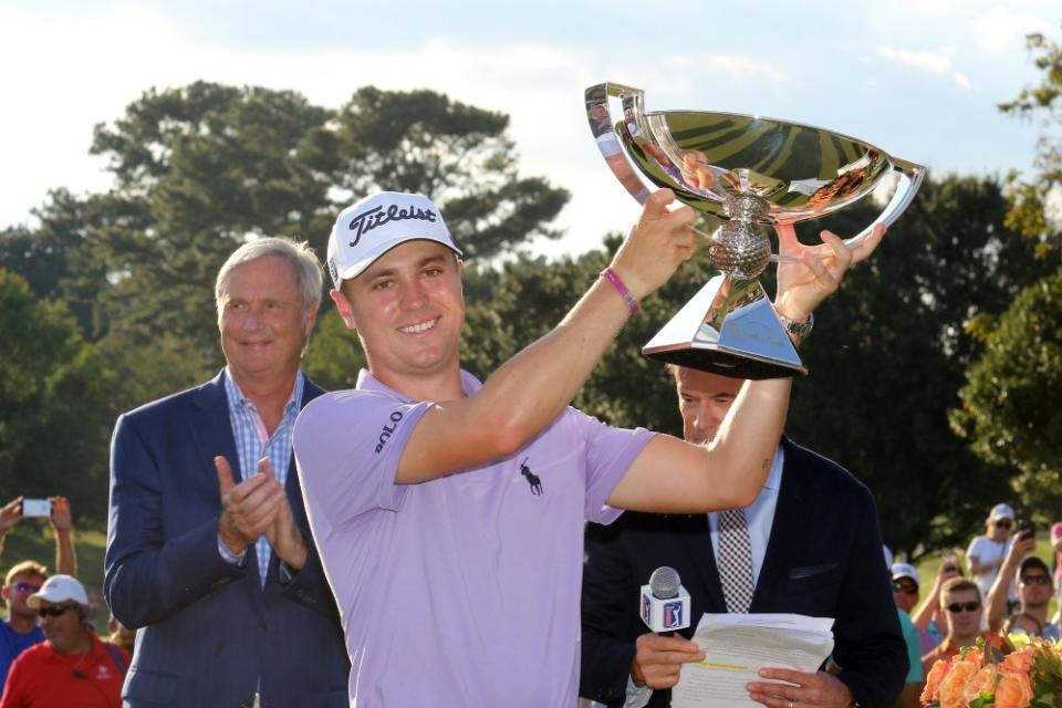 Justin Thomas holds up the FedEx Cup Trophy after the final round of the PGA Tour Championship on September 24, 2017, at East Lake Golf Club in Atlanta, Georgia. (Photo by Michael Wade/Icon Sportswire via Getty Images)