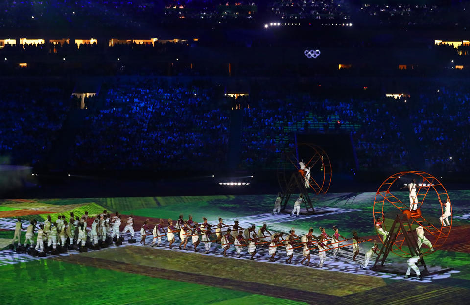 <p>Performers dance at the Geometrization: Arrival of The Africans during the Opening Ceremony of the Rio 2016 Olympic Games at Maracana Stadium. (Photo by Dean Mouhtaropoulos/Getty Images) </p>