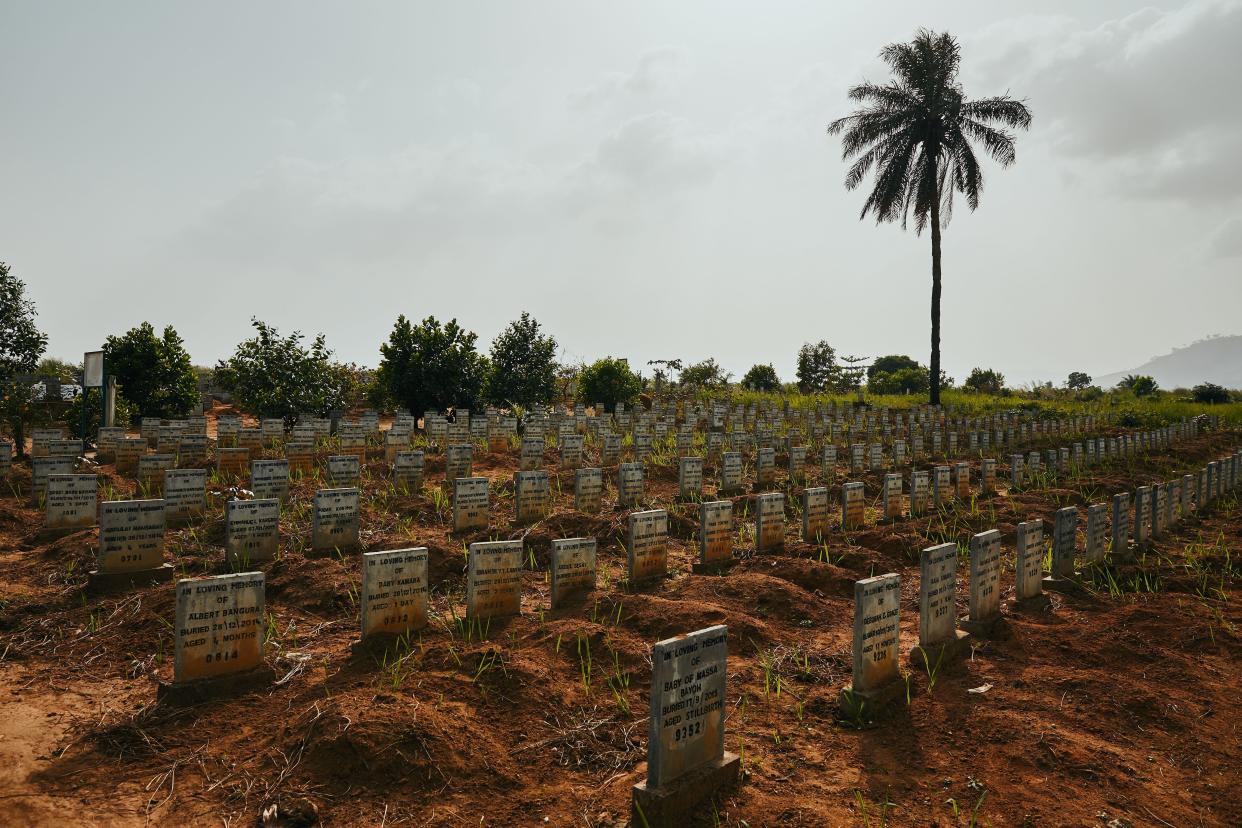 Headstones line the Waterloo Ebola graveyard in Waterloo, Sierra Leone on December 14, 2017.