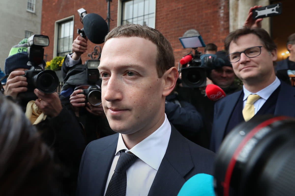 Facebook CEO Mark Zuckerberg leaving The Merrion Hotel in Dublin with Nick Clegg (right) after a meeting with politicians to discuss regulation of social media and harmful content (Niall Carson/PA) (PA Archive)