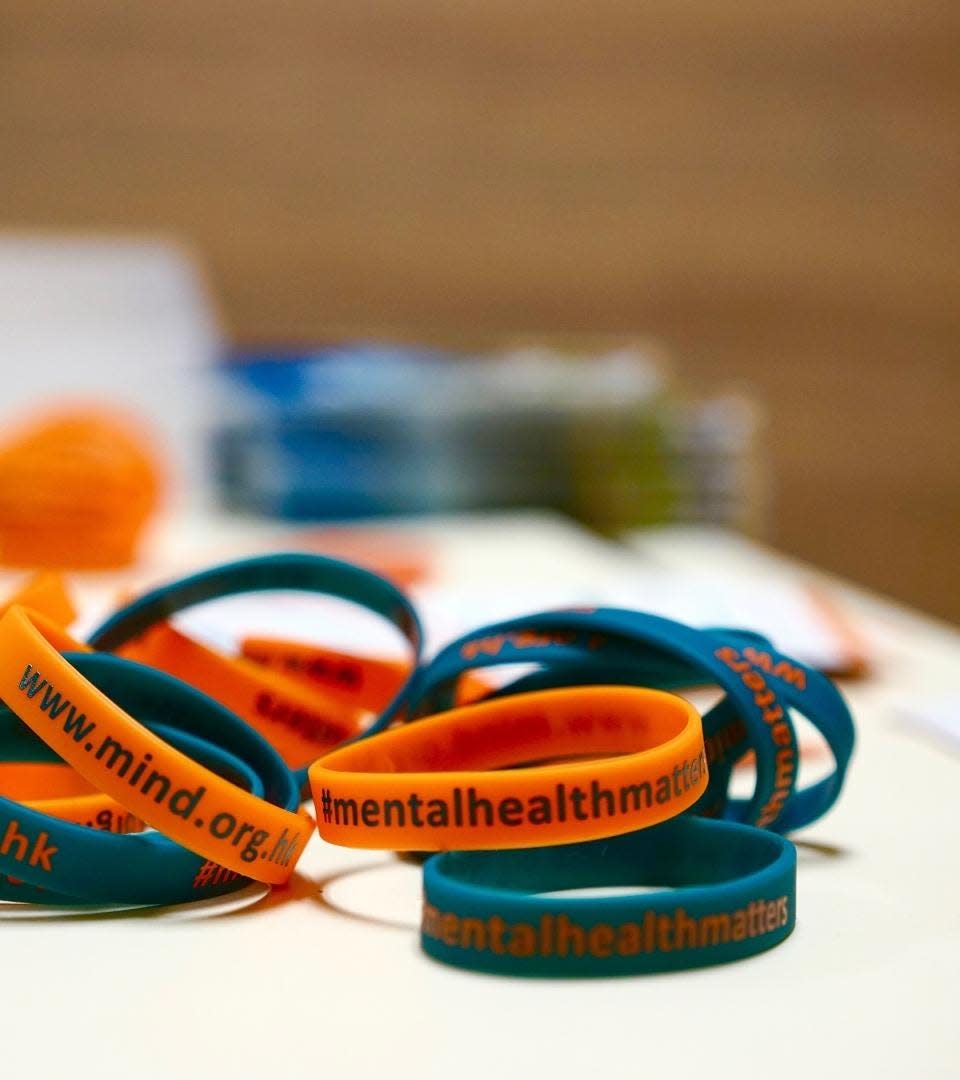 Picture of rubber friendship bands with the words 'mental health matters' printed on them