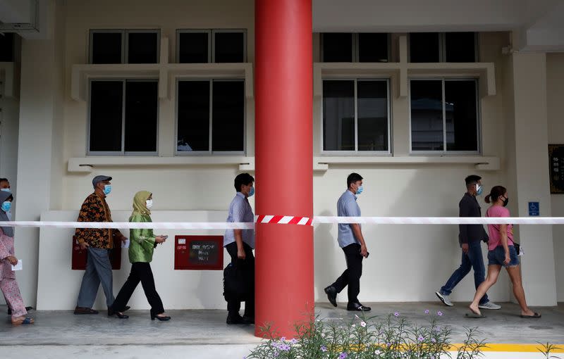 People vote in Singapore's general election amid Covid-19