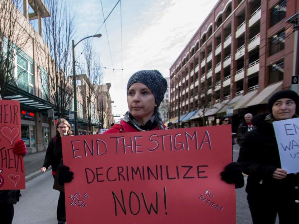 Protesters advocate for drug decriminalization in Vancouver in February 2018. Personal possession of small amounts of some drugs will be decriminalized in B.C. starting early next year. (Tina Lovgreen/CBC - image credit)
