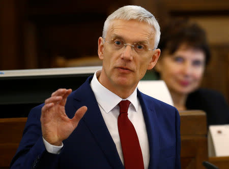 Nominated Latvia's Prime Minister's candidate Krisjanis Karins presents his cabinet to the Parliament before its vote in Riga, Latvia January 23, 2019. REUTERS/Ints Kalnins
