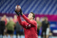 FILE - Iowa tight end Sam Laporta runs a drill at the NFL football scouting combine in Indianapolis, Saturday, March 4, 2023. This year’s draft class features an abundance of tight ends, and some are even calling it better than the bumper crop of 2017. “The tight end group is the best I’ve seen in the last 10 years,” NFL Network analyst Daniel Jeremiah proclaimed.(AP Photo/Darron Cummings, File)