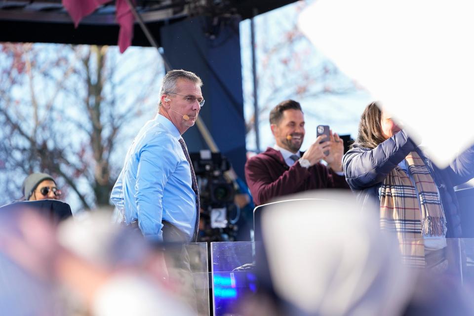 Oct 29, 2022; University Park, Pennsylvania, USA; Former Ohio State Buckeyes head coach Urban Meyer stands on the set of the Fox Big Noon Kickoff prior to the NCAA Division I football game between the Penn State Nittany Lions and the Ohio State Buckeyes at Beaver Stadium. Mandatory Credit: Adam Cairns-The Columbus Dispatch