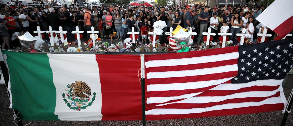 El Pasoans show up at a memorial Monday, Aug. 5, 2019, to pay their respects to those who lost their lives in an attack that killed 22 people and wounded 25 others.