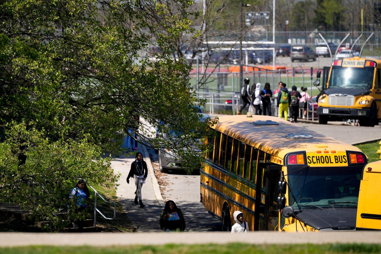 Students leave Withrow University High School in Hyde Park after the final bell April 12.