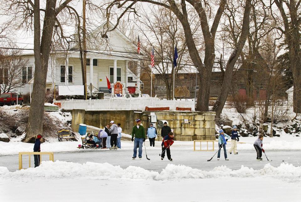 Skaters enjoy a game of hockey Lake Champlain during the Great Ice in Grand Isle event in North Hero on Saturday, February 2, 2008.