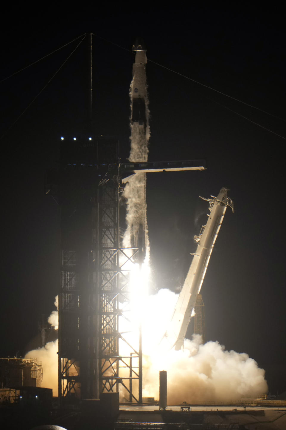 A SpaceX Falcon 9 rocket lifts off from Launch Complex 39-A Wednesday, April 27, 2022, at the Kennedy Space Center in Cape Canaveral, Fla. Four astronauts will fly on SpaceX's Crew-4 mission to the International Space Station. (AP Photo/Chris O'Meara)