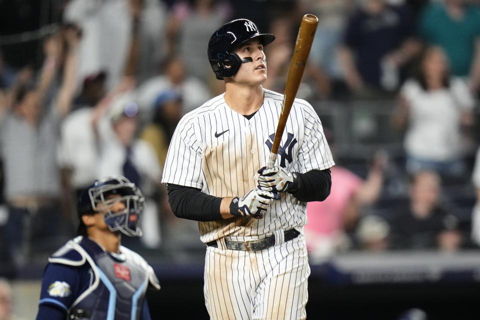 Anthony Rizzo watches his two-run home run against the Tampa Bay Rays during the eighth inning of a baseball game Friday, May 12, 2023, in New York. The Yankees won 6-5. (AP Photo/Frank Franklin II)