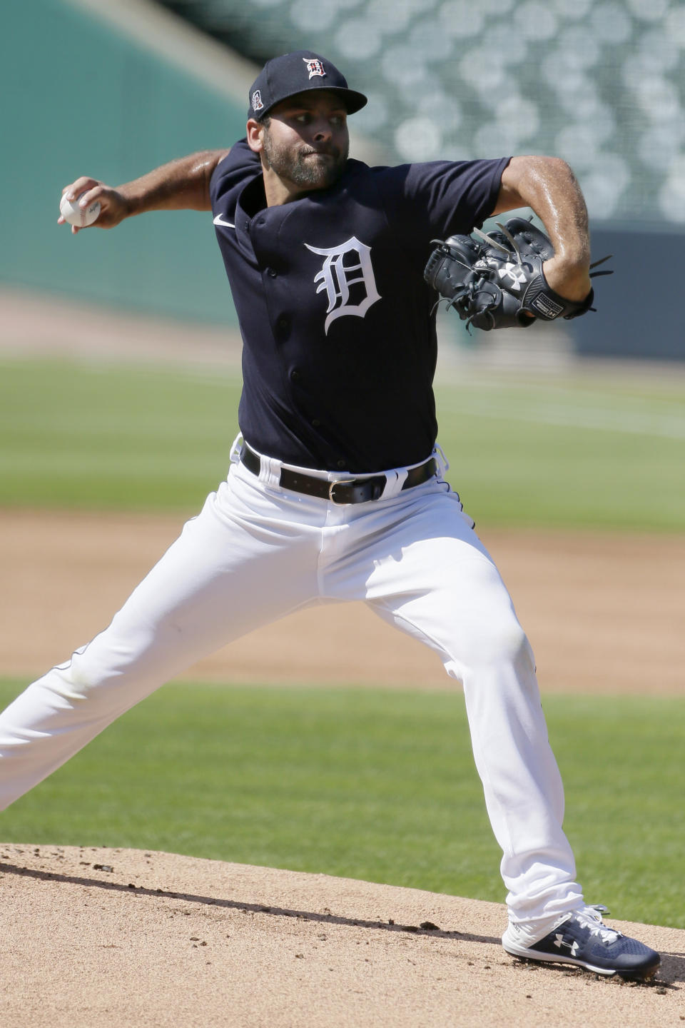 Detroit Tigers' Michael Fulmer pitches from the mound during baseball training camp at Comerica Park, Friday, July 3, 2020, in Detroit. (AP Photo/Duane Burleson)