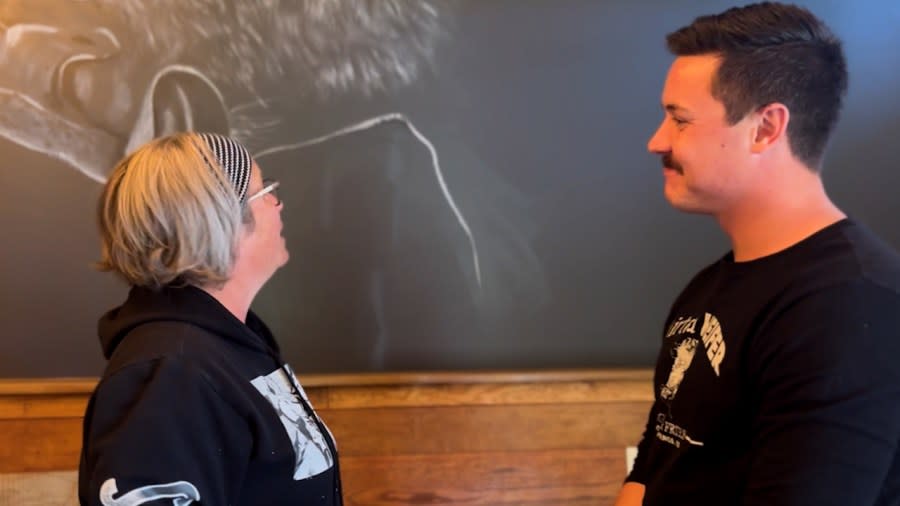 Kevin Megyeri smiled alongside Tallery Conarty, as the two looked out on her newly completed mural of a cow on one of the walls.