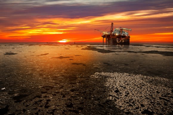 Drilling rig at twilight.