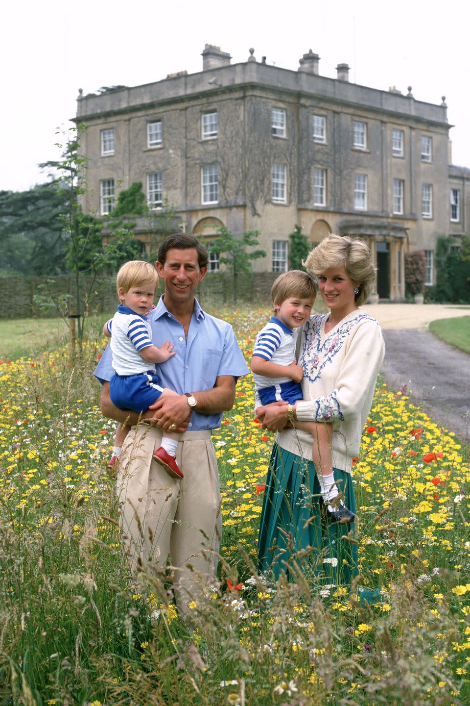 <p>Harry poses with Prince Charles, Princess Diana, and Prince William in the wildflower meadow at Highgrove House. </p>