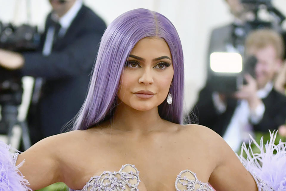 FILE - In this May 6, 2019, file photo, Kylie Jenner attends The Metropolitan Museum of Art's Costume Institute benefit gala in New York. Forbes magazine, which once declared Jenner a billionaire on its cover, says she no longer deserves the title if she ever did, but Jenner is pushing back. Forbes said in a story posted Friday that an examination of financial filings after the reality star and beauty mogul sold 51% of her company Kylie Cosmetics to Coty in a January deal valued at $1.2 billion reveal that Jenner’s worth was inflated. (Photo by Charles Sykes/Invision/AP, File)