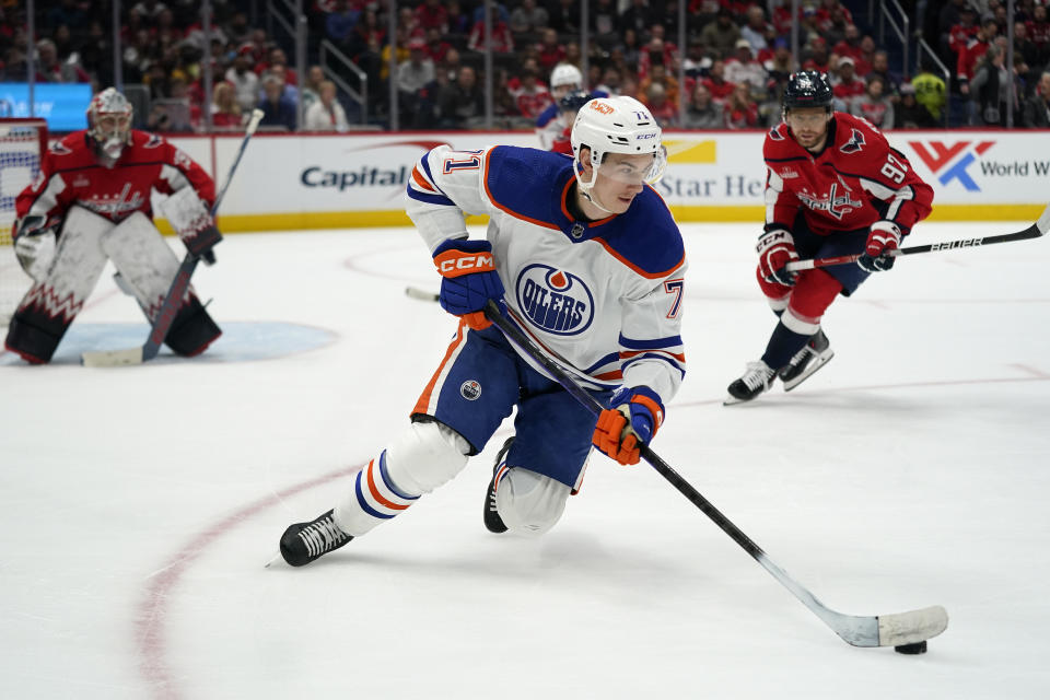 Edmonton Oilers center Ryan McLeod (71) skates with the puck in the second period of an NHL hockey game against the Washington Capitals, Monday, Nov. 7, 2022, in Washington. (AP Photo/Patrick Semansky)