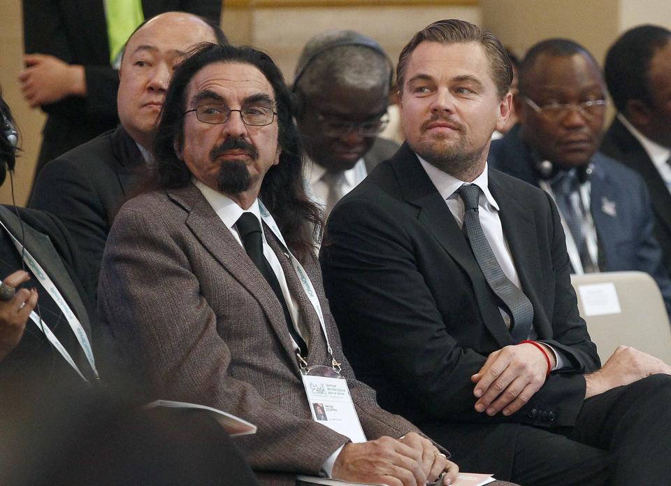 Leo and George sit together at an event