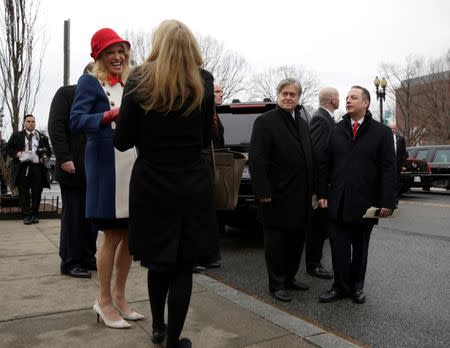 Advisors to President-elect Donald Trump, Kellyanne Conway (L), Steve Bannon, (3rd R) and incoming White House Chief of Staff Reince Priebus (R) depart from services at St. John's Church during the Presidential Inauguration in Washington, U.S., January 20, 2017. REUTERS/Joshua Roberts