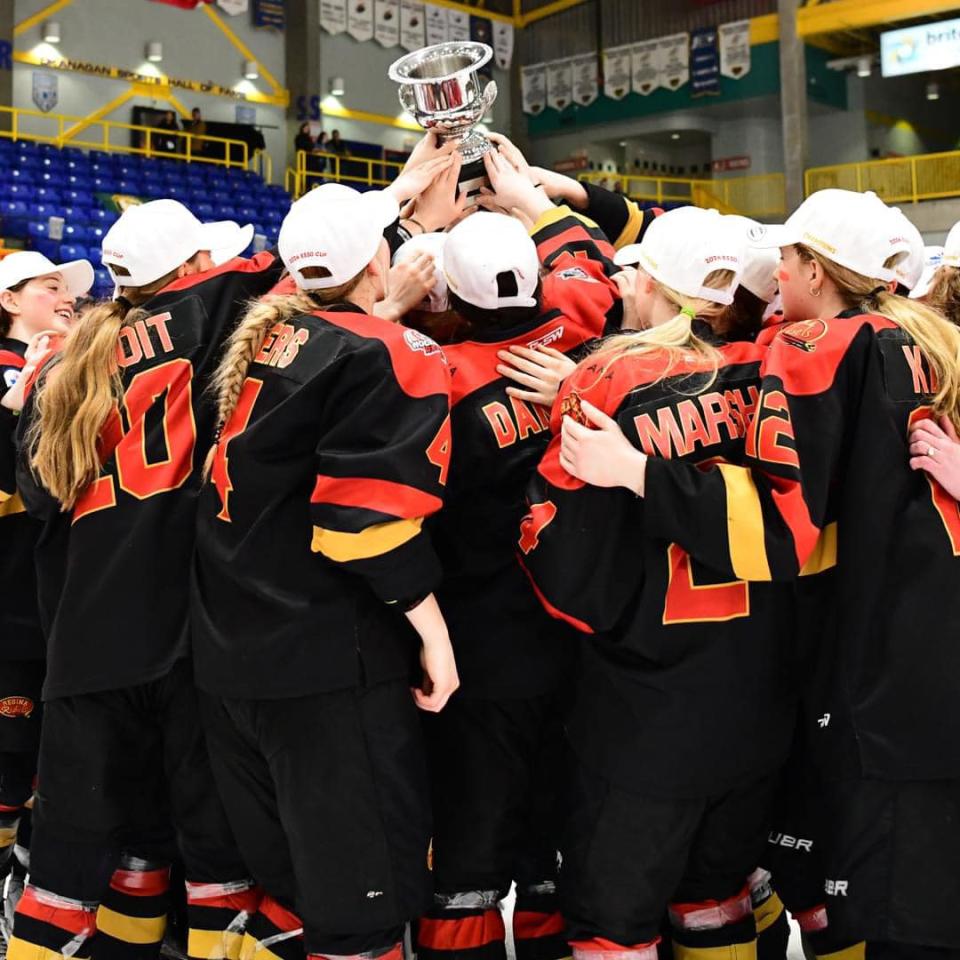 Regina Rebels players hoist the trophy after beating the North York Storm in the gold medal game at the Canada’s Women’s U18 National Club Championship.