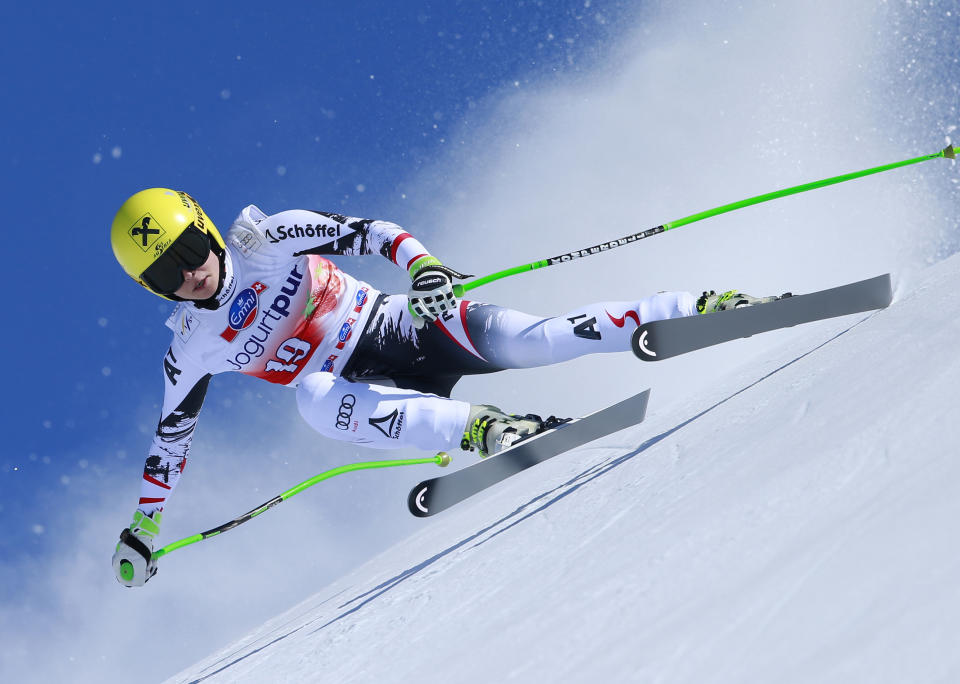 Austria's Anna Fenninger speeds down the course on her way to take sixth place in a women's alpine skiing downhill at the World Cup finals in Lenzerheide, Switzerland, Wednesday, March 12, 2013. Anna Fenninger was second in the downhill standings. (AP Photo/Shinichiro Tanaka)