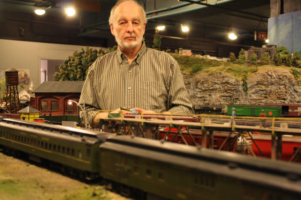 An operator controls trains. After 67 years in the Liberty Village location, The Model Railroad Club of Toronto will be moving to make way for a condo.