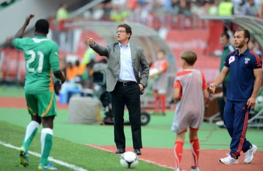 La selección de Rusia de fútbol empató 1-1 con su par de Costa de Marfil, este miércoles en Moscú, en un partido amistoso que sirvió de debut sin luces para el italiano Fabio Capello en el banquillo ruso, de cara al inicio de las eliminatorias mundialistas europeas en septiembre. (AFP | natalia kolesnikova)