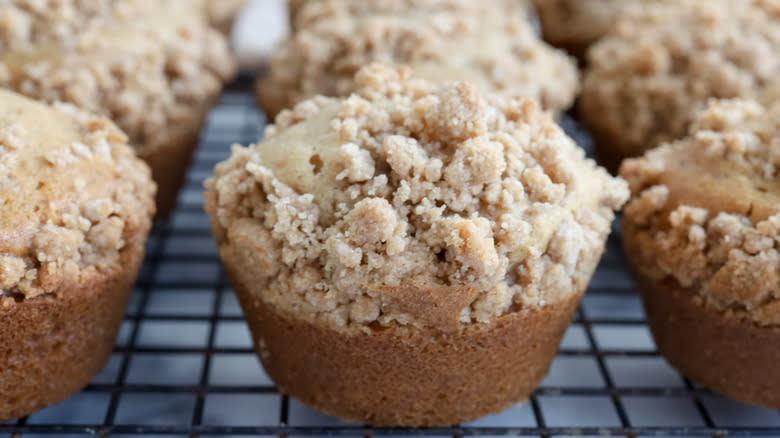 snickerdoodle muffins on wire rack