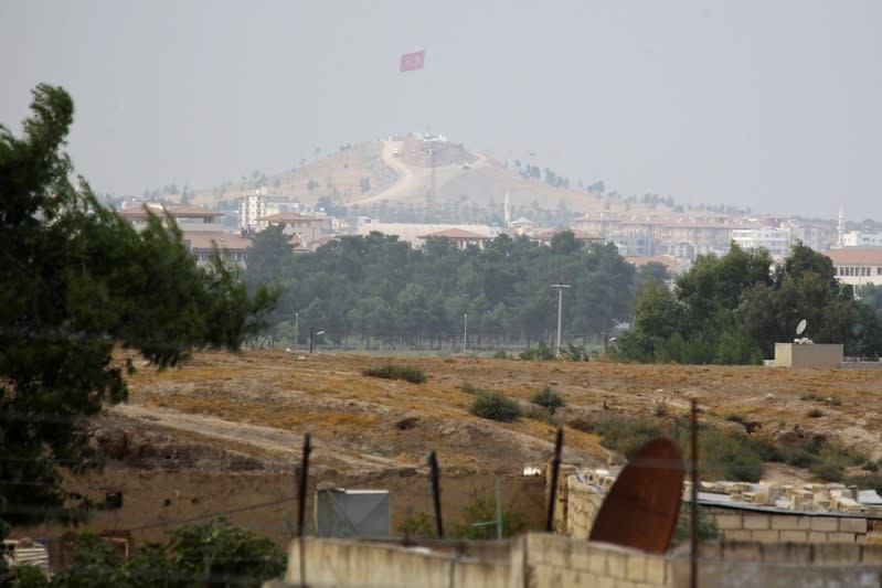 Turkish flag flies as seen from near Ras al Ain Town