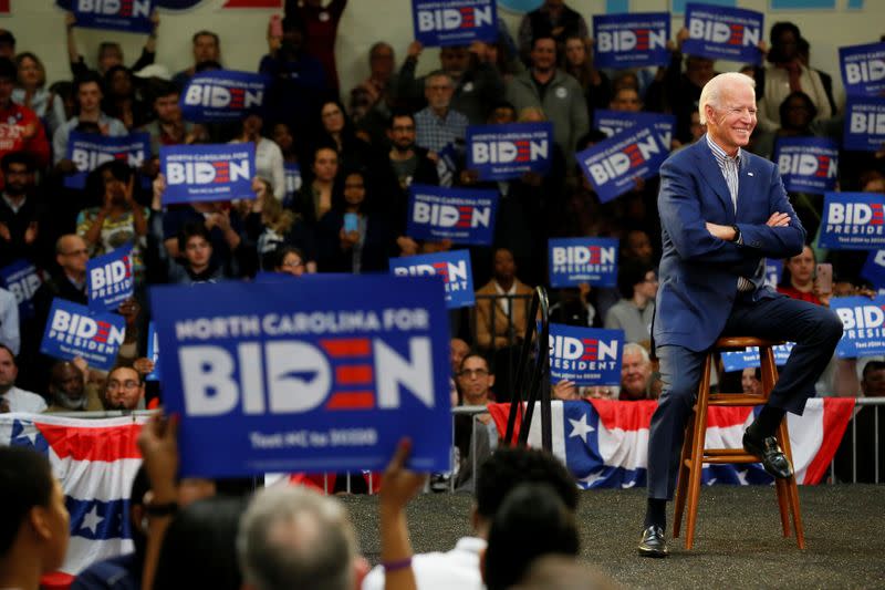 Democratic U.S. presidential candidate and former U.S. Vice President Joe Biden listens to the introductory speakers during a campaign event at Saint Augustine's University in Raleigh