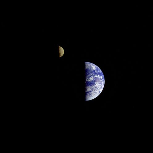 <span class="caption">Earth and Moon as seen by the Galileo spacecraft.</span> <span class="attribution"><span class="source">NASA</span></span>