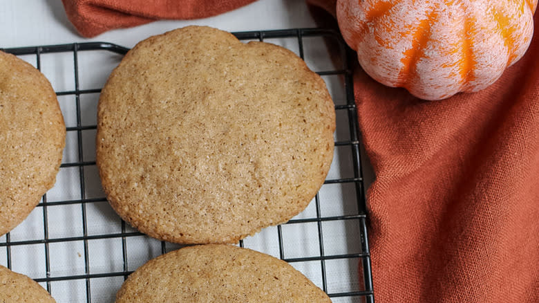 Pumpkin cookies on cooling rack