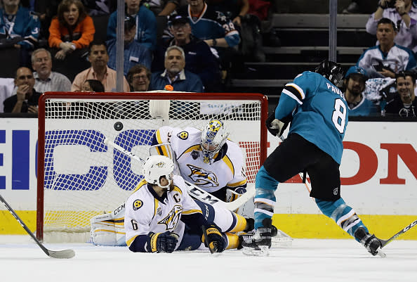 SAN JOSE, CA - MAY 12: Joe Pavelski #8 of the San Jose Sharks scores a goal past Shea Weber #6 and goalie Pekka Rinne #35 of the Nashville Predators in the first period of Game Seven of the Western Conference Second Round during the 2016 NHL Stanley Cup Playoffs at SAP Center on May 12, 2016 in San Jose, California. (Photo by Ezra Shaw/Getty Images)