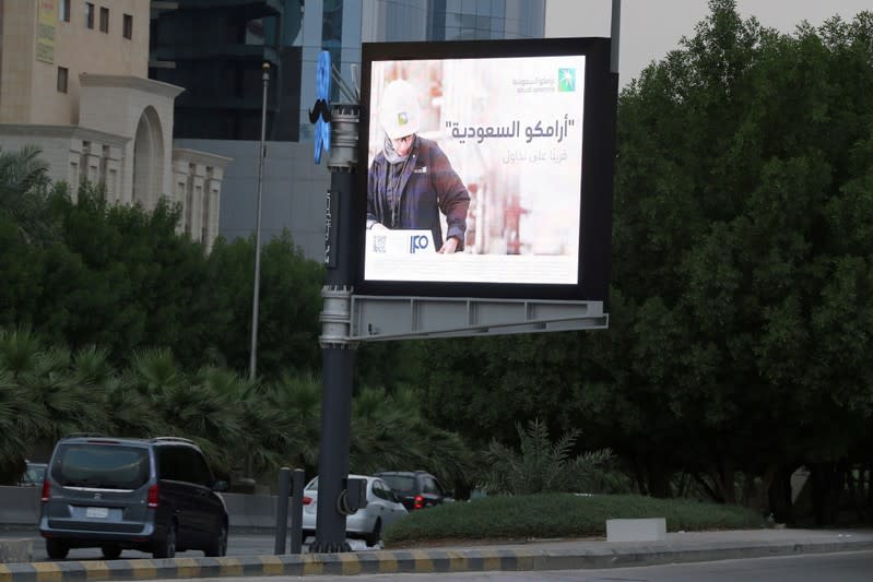 FILE PHOTO: A billboard display an advert for Saudi Aramco in the streets in Riyadh