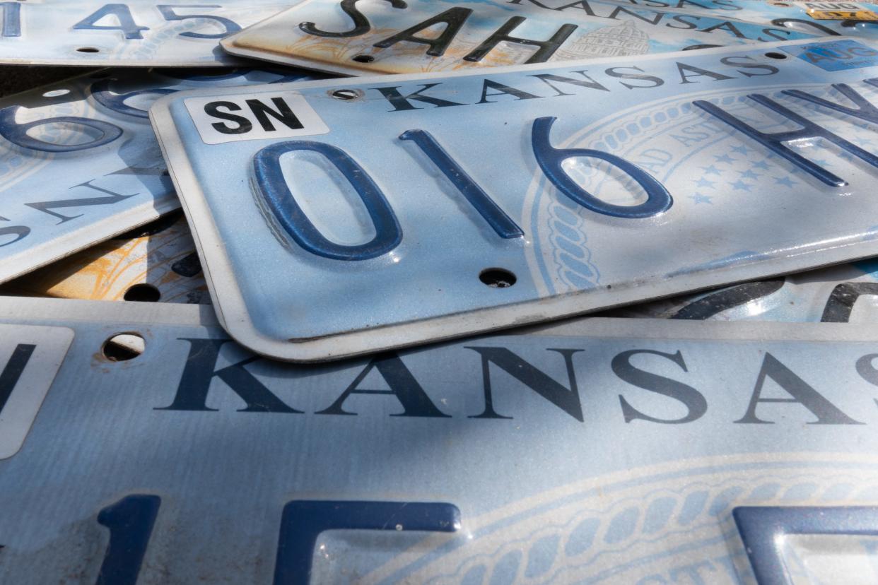Remaining standard embossed Ad Astra license plates like these ones are scheduled to be replaced with digitally produced ones if the Kansas Department of Revenue can secure $9.8 million in federal funding.
