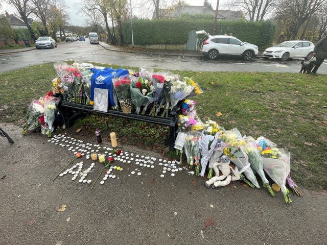 Tributes left on a bench on Broadgate Lane, Horsforth, following the death of Alfie Lewis in November