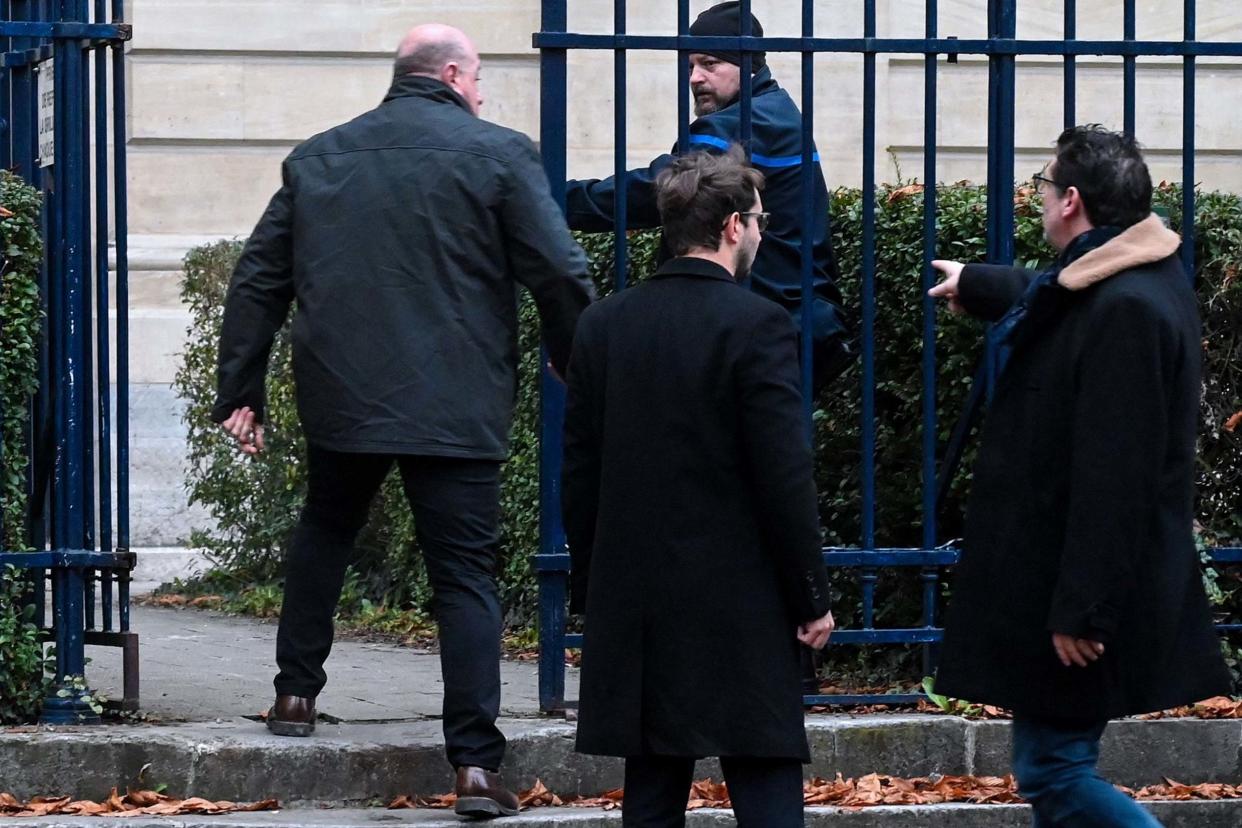 Willy Bardon (L), accused of kidnapping, confinement, rape and murder in the case of Elodie Kulik arrives with his lawyers: AFP via Getty Images