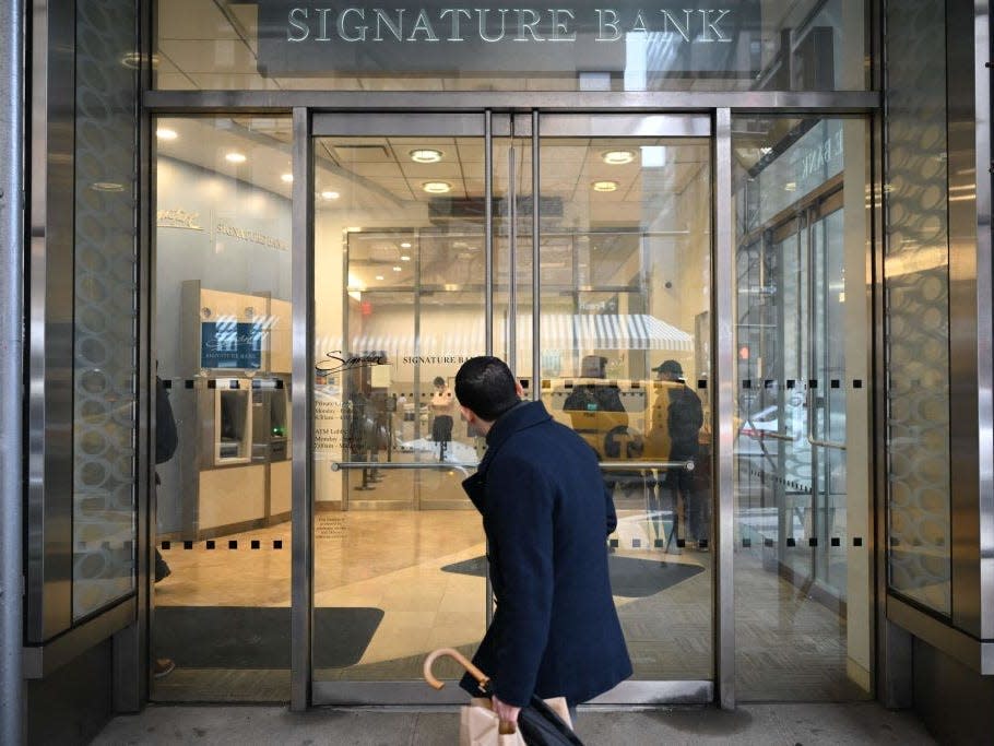 Man looking into a bank